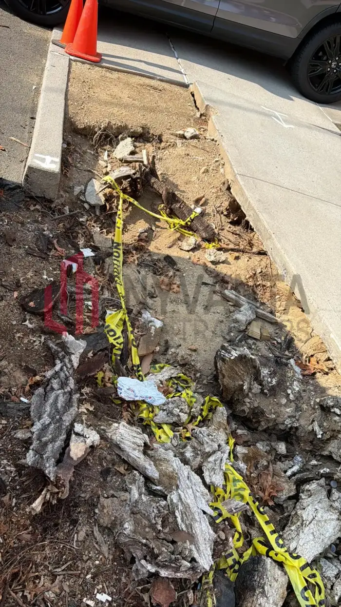 Broken-out concrete cleared from the work area before base preparation