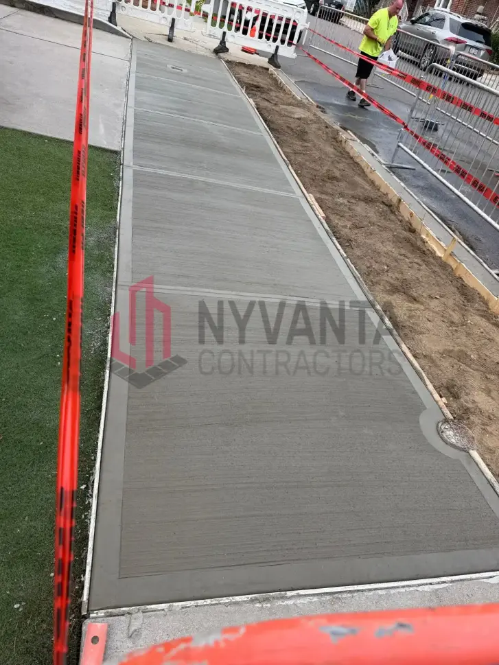 Newly replaced sidewalk flags at a residential property on 168th St in Flushing, Queens